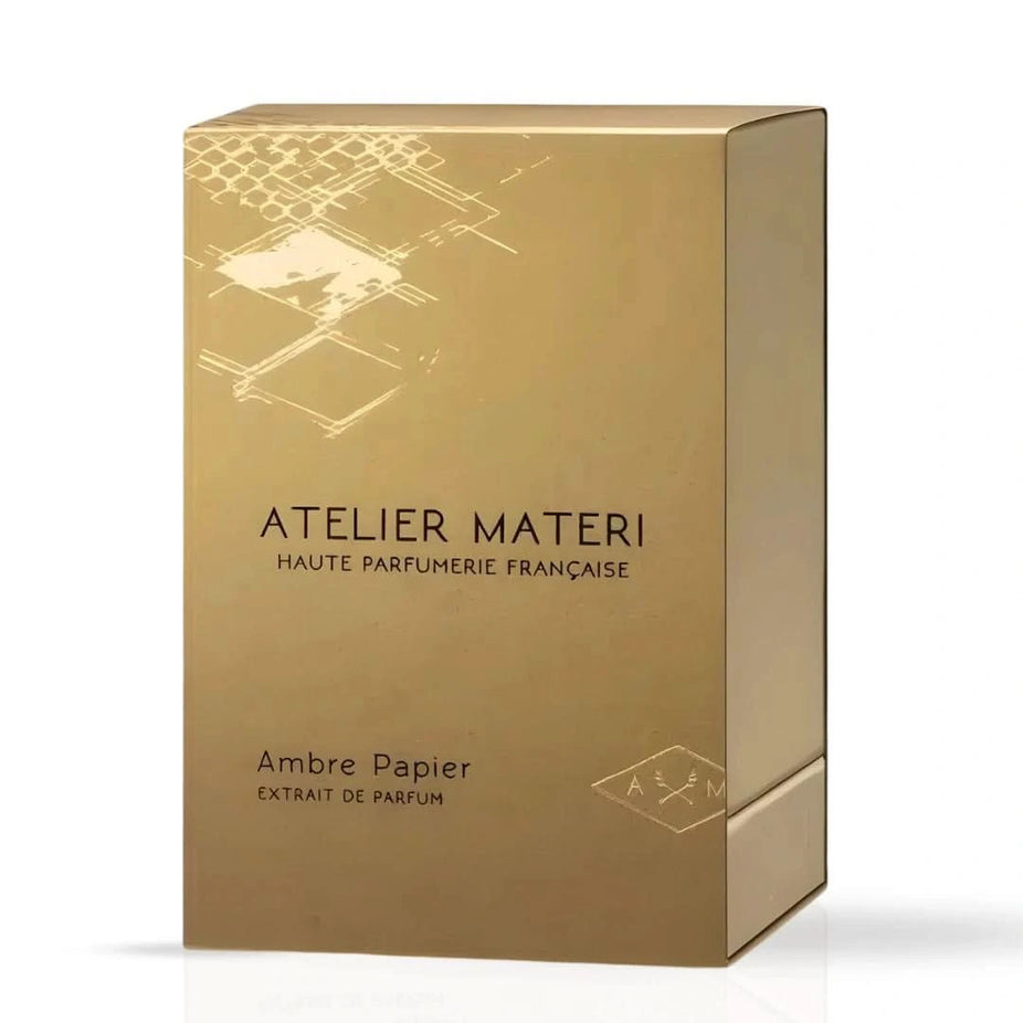 Bottle of Atelier Materi Ambre Papier Extrait de Parfum Spray 50ml, elegant glass perfume bottle with gold accents.