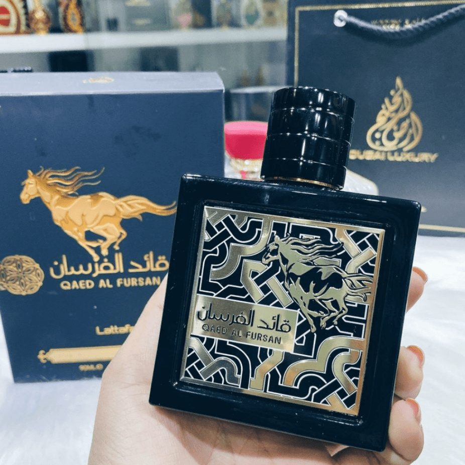 Qaed Al Fursan Eau de Parfum spray bottle by Lattafa, 90ml, with elegant packaging and fragrance details visible.