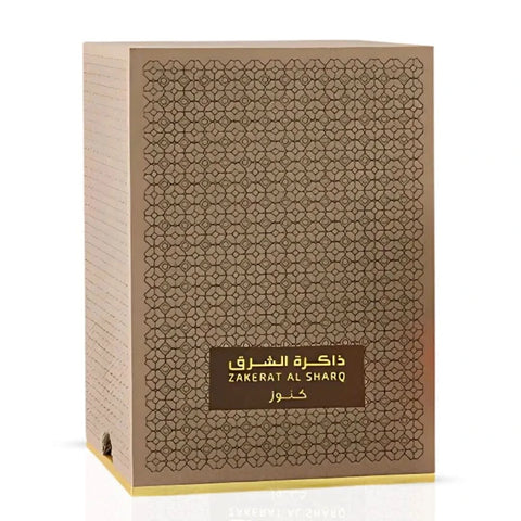 Rasasi Zakerat Al Sharq Kunooz Concentrated Perfume Oil 20ml bottle with elegant label and cap, showcasing traditional Arabian fragrance packaging.