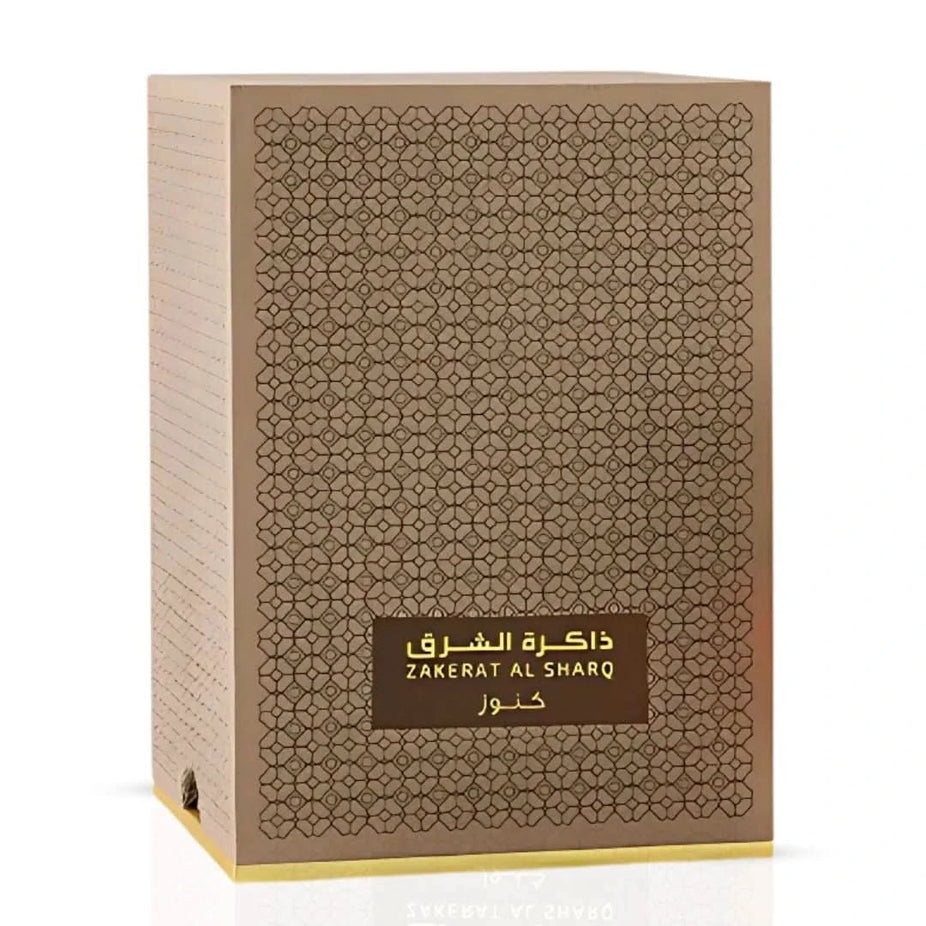 Rasasi Zakerat Al Sharq Kunooz concentrated perfume oil 20ml bottle with ornate cap, showcasing elegant packaging and deep fragrance.