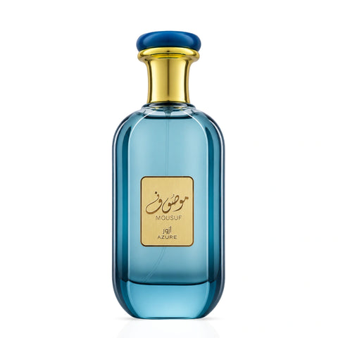 Mousuf Azure Eau de Parfum spray by Ard Al Zaafaran, 100ml, featuring a sleek bottle with a silver cap and blue fragrance liquid.