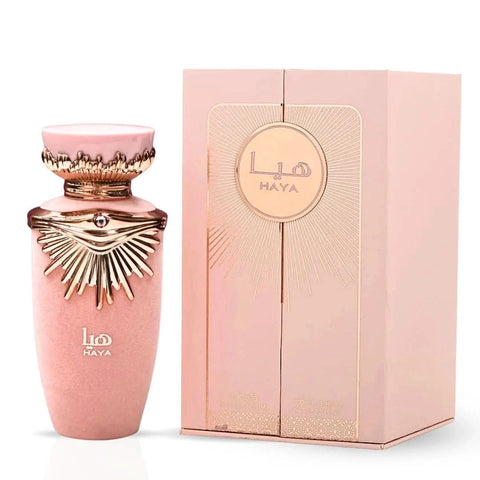 Lattafa Haya Eau de Parfum and All Over Spray bundle, featuring 100ml perfume bottle and 150ml versatile spray on white background.