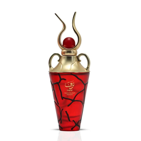 Lattafa Niche Emarati Taraf Eau De Parfum spray in a velvet pouch, 100ml, featuring a luxurious fragrance bottle.