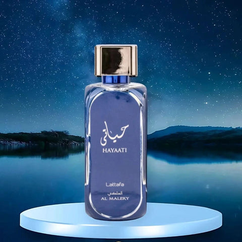 Lattafa Hayaati Al Maleky Eau de Parfum spray 100ml displayed in velvet pouch, showcasing elegant fragrance packaging.