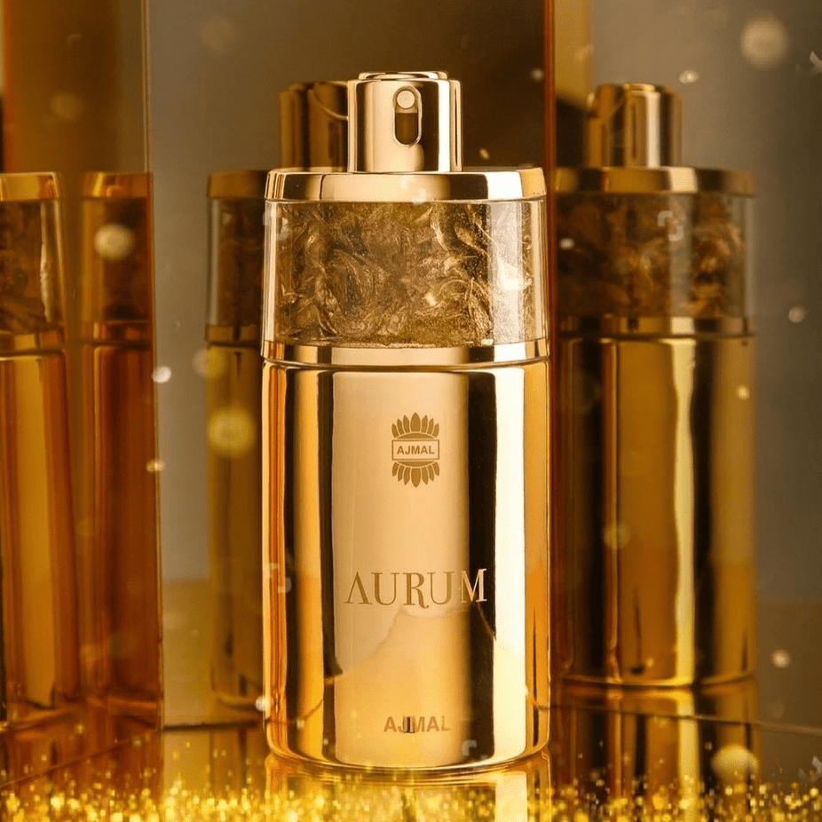 Aurumm for Women EDP by Ajmal, 75ml bottle, elegant perfume display with floral and fruity notes in a sleek glass bottle.