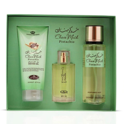 Al Rehab Choco Musk Pistachio 3-piece perfume gift set with bottles featuring decorative labels and caps, perfect for gifting.
