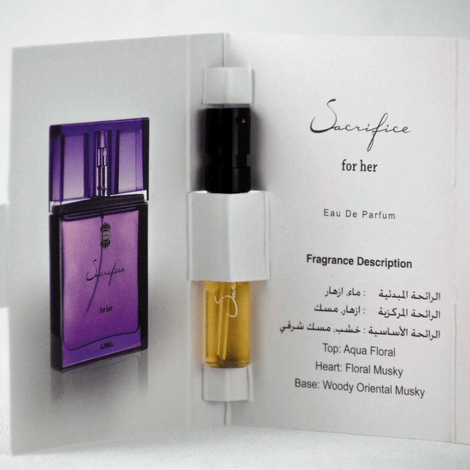 Ajmal Sacrifice EDP sample for women, 1ml, showcasing the small fragrance vial with a sleek design.
