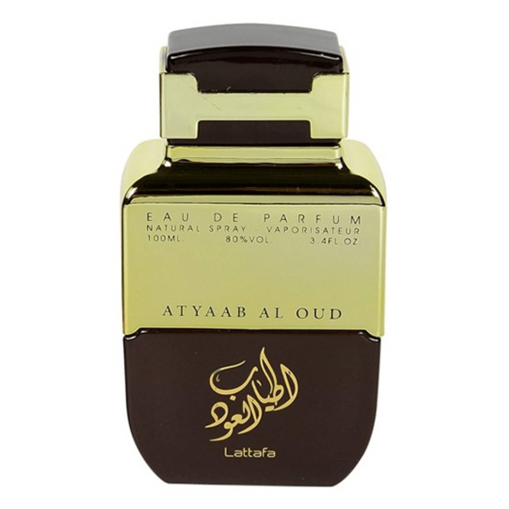 Lattafa Atyaab Al Oud EDP 100ML bottle with velvet pouch, showcasing elegant glass perfume bottle and floral design details.