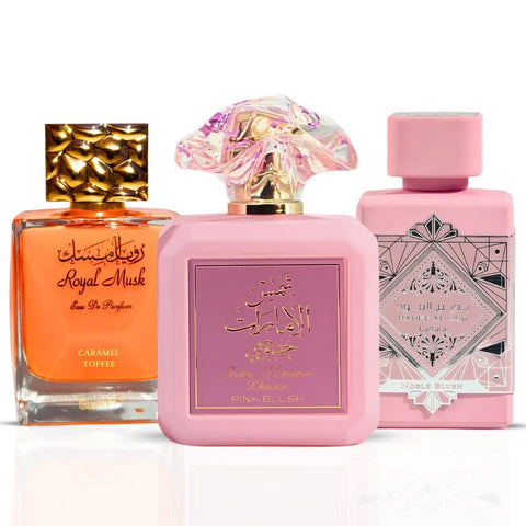 Bundle of three 100ml Eau de Parfum sprays featuring Pink Blush by Ard Al Zaafaran, Noble Blush by Lattafa, and Caramel Toffee by Surrati.