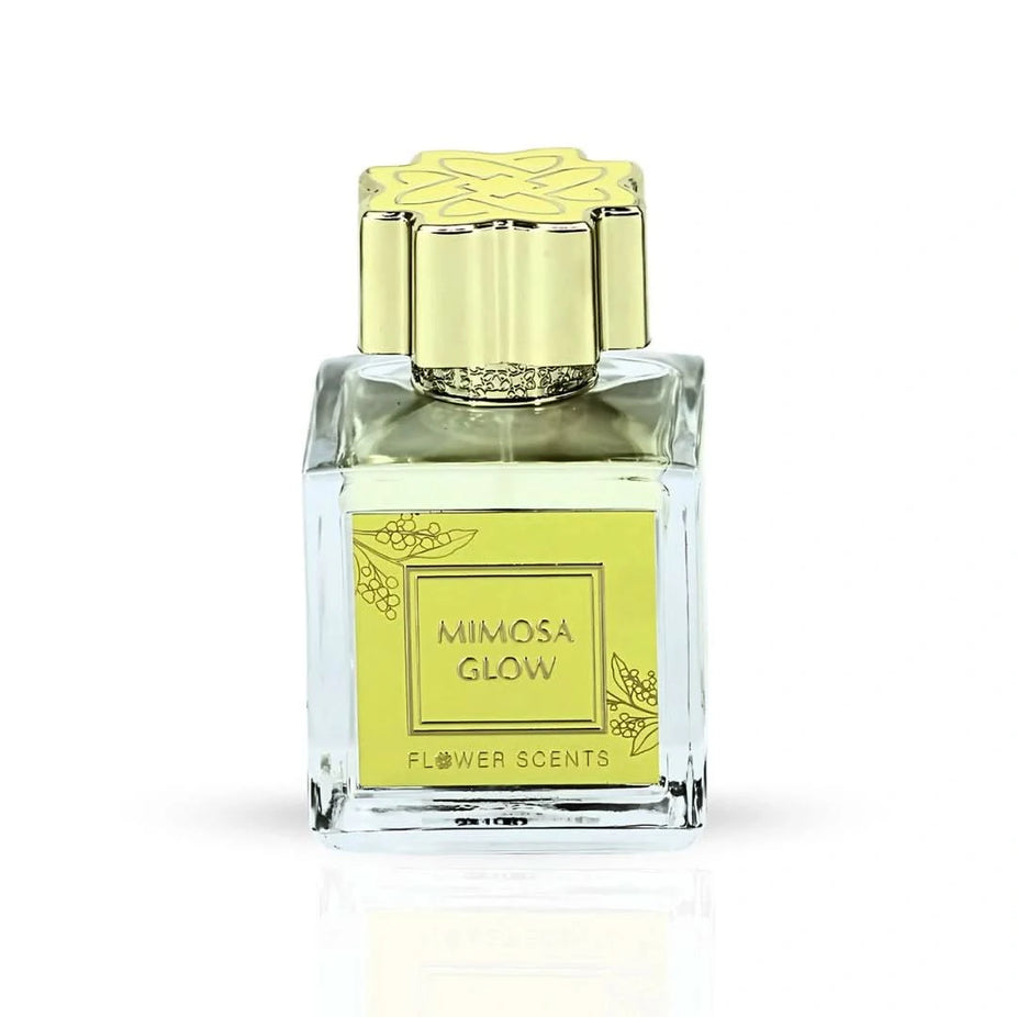 Flower Scents Mimosa Glow Eau de Parfum spray 65ml bottle, elegant packaging and floral design visible in the image.