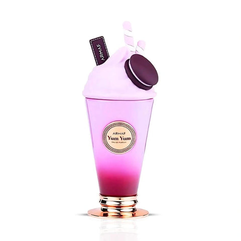 Armaf Delights Yum Yum Eau de Parfum spray in a 100ml bottle, shown with velvet pouch, showcasing elegant perfume packaging.
