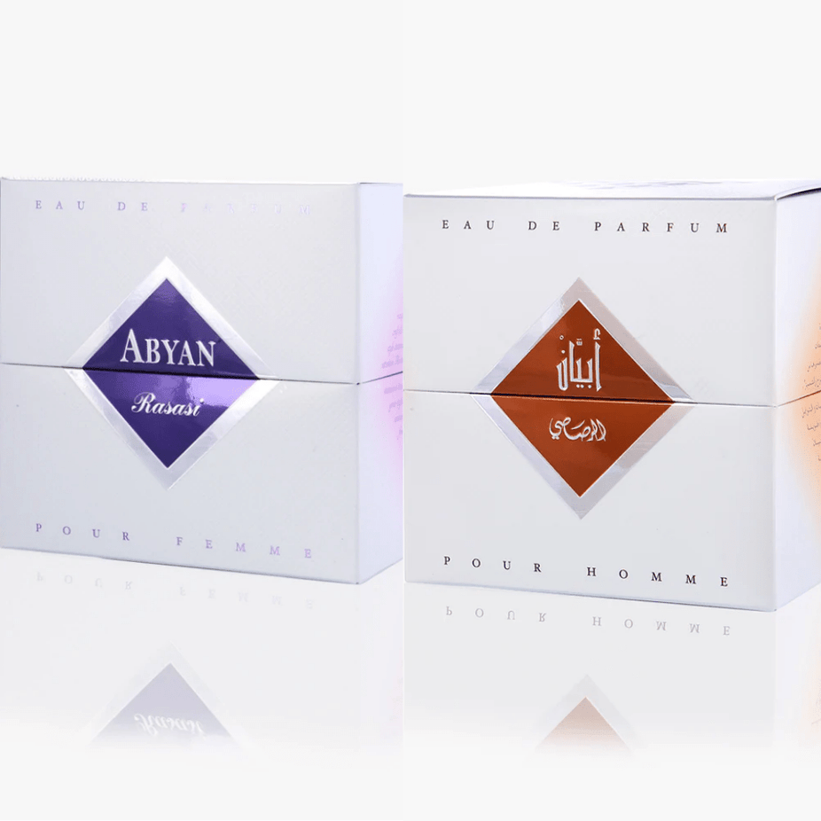 Bundle of Rasasi Abyan EDP for Men and Women, 100ml bottles, featuring elegant perfume bottles with sleek design.