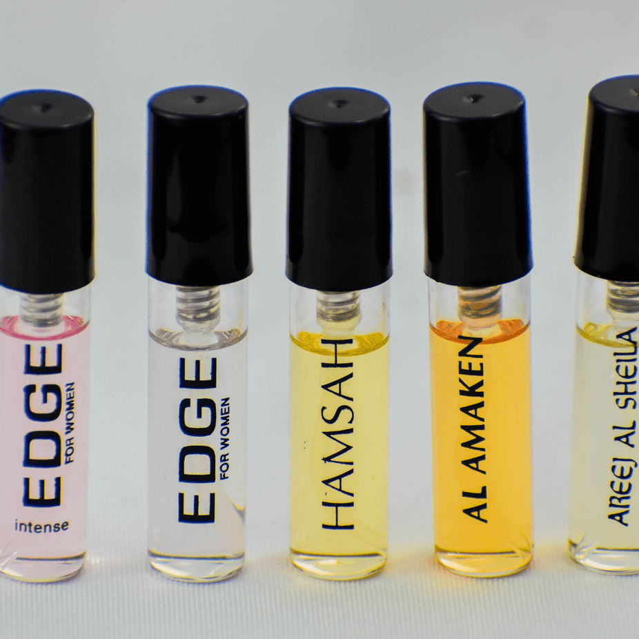 Swiss Arabian Edge Women and Hamsah perfume samples, including Edge Intense Women and Areej Al Sheila, displayed in sample bottles.