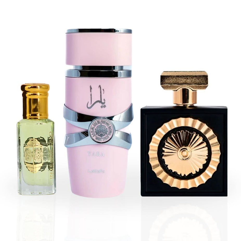 Yara Nebras Eau de Parfum spray and Lady Mile Perfume Oil in a magnetic gift box by Intense Oud, showcasing elegant packaging.