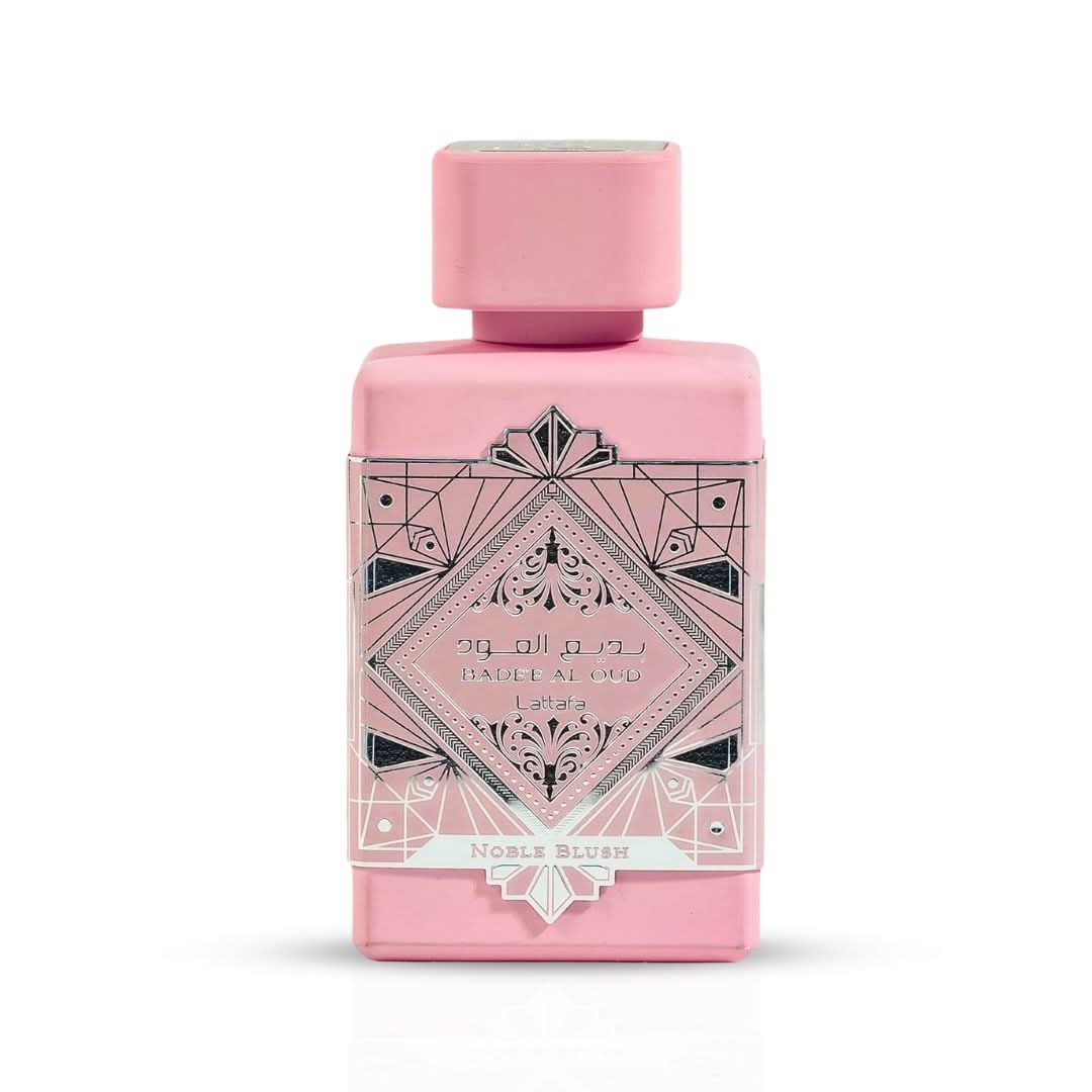Lattafa Bade'e Al Oud Noble Blush Eau De Parfum spray in 100ml bottle, showcased with a velvet pouch in the image.