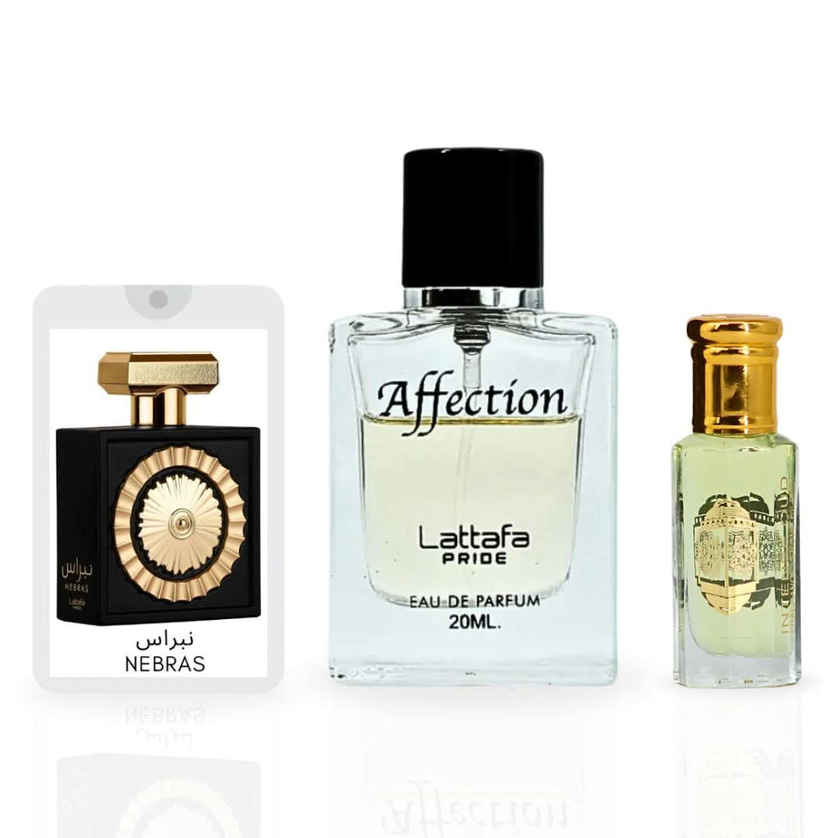 Intense Oud gift set featuring Nebras & Affection Eau de Parfum sprays and Lady Mile perfume oil in a magnetic box.