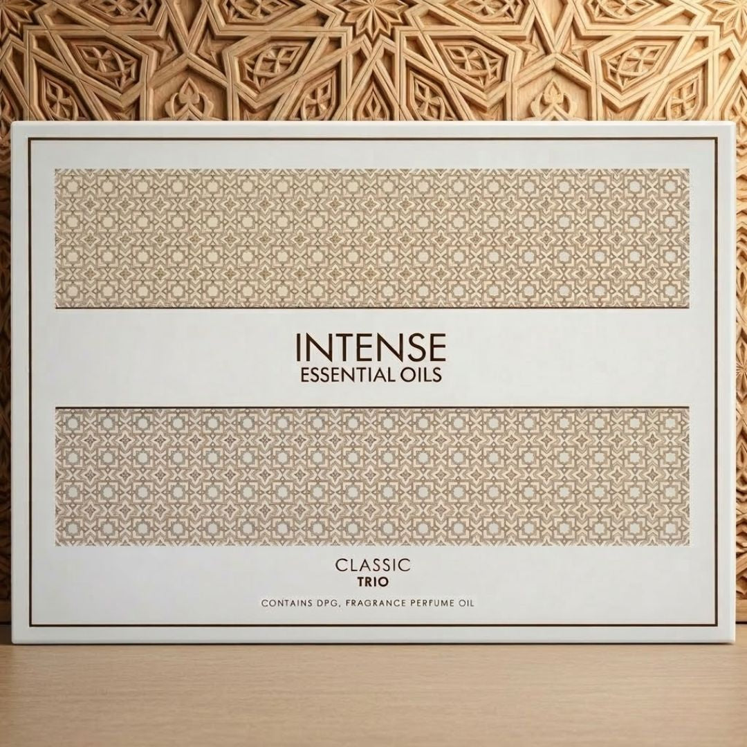 Intense Oud Intense Essential Oils Classic gift set featuring concentrated perfume oil bottles with elegant packaging.