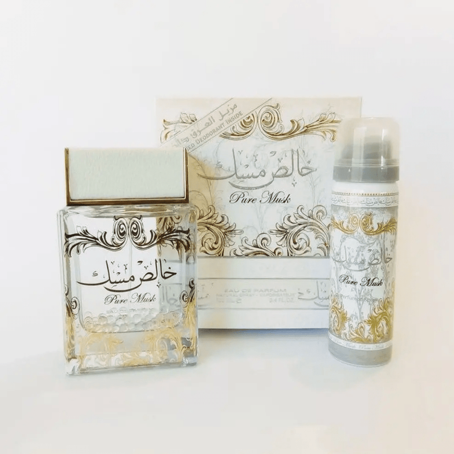 Lattafa Pure Musk Eau de Parfum spray 100ml bottle, featuring a sleek design and floral musk scent for women.