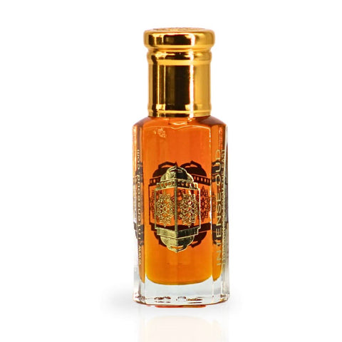 Intense Oud Mukhalat Malaki perfume oil in a 12ml glass bottle with black gift box, featuring luxurious loose oil packaging.