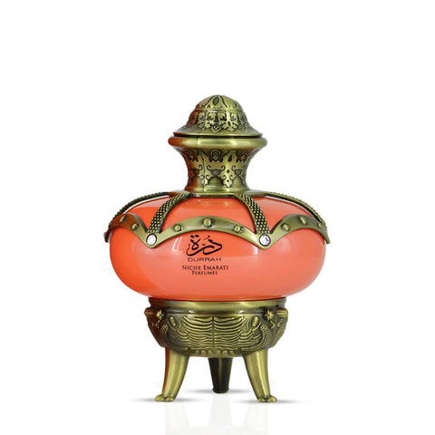 Lattafa Niche Emarati Durrah Eau De Parfum spray, 100ml bottle with velvet pouch, showcasing elegant fragrance packaging.