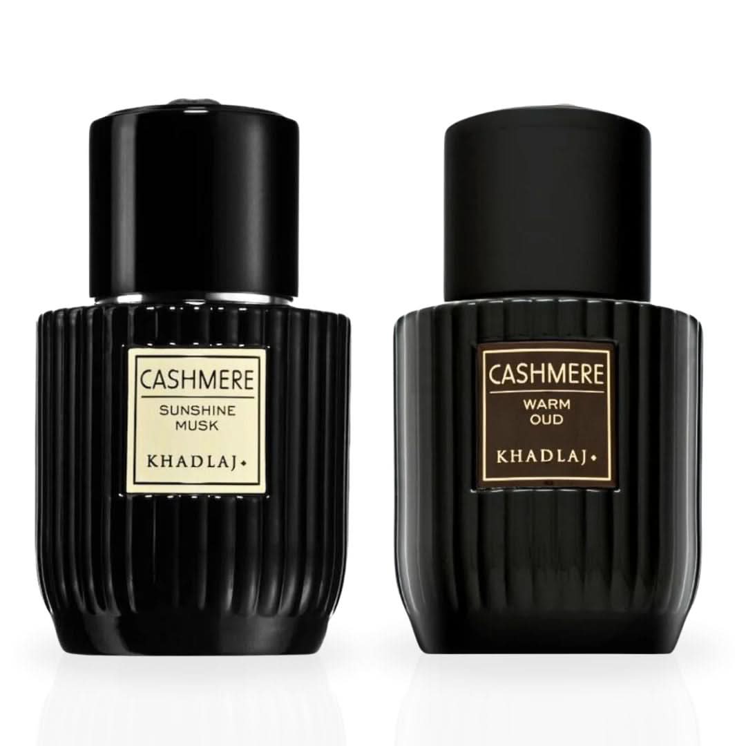 Bundle of Khadlaj Cashmere Sunshine Musk and Warm Oud Eau de Parfum sprays, 100ml each, featuring elegant perfume bottles.