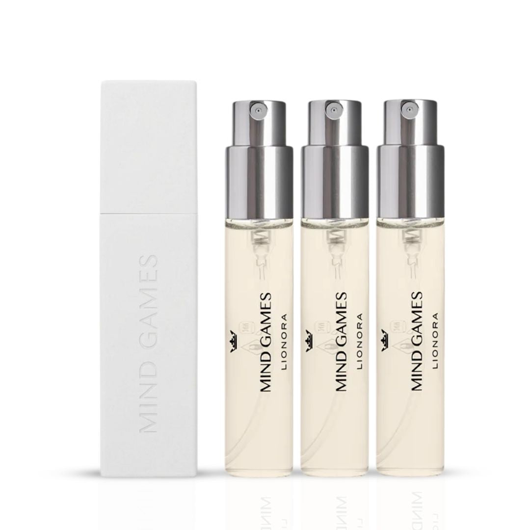 Lionora Travel Trio by Mind Games showing three small 7.5ml perfume bottles in a collection with labels visible