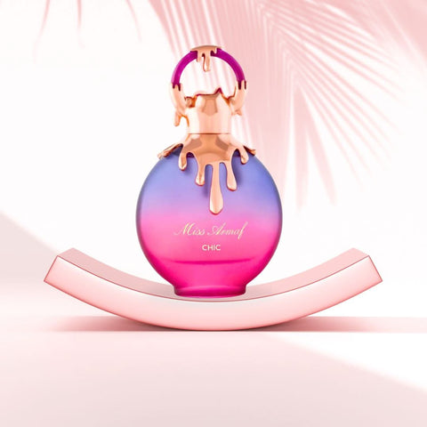 Three bottles of Miss Armaf Chic Eau de Parfum Spray by Armaf, 100ml each, arranged in a value pack with elegant bottle design.
