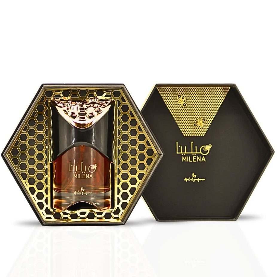 Milena Eau de Parfum Spray by Ard Al Zaafaran in 100ml bottle, featuring elegant glass and floral fragrance details.