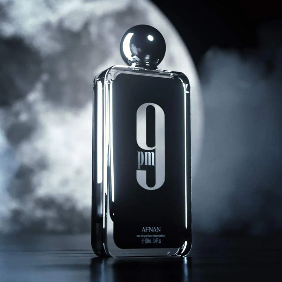 A bundle of three 100ml Afnan 9PM & 9PM Rebel Eau de Parfum sprays arranged together, showcasing sleek bottles and caps.
