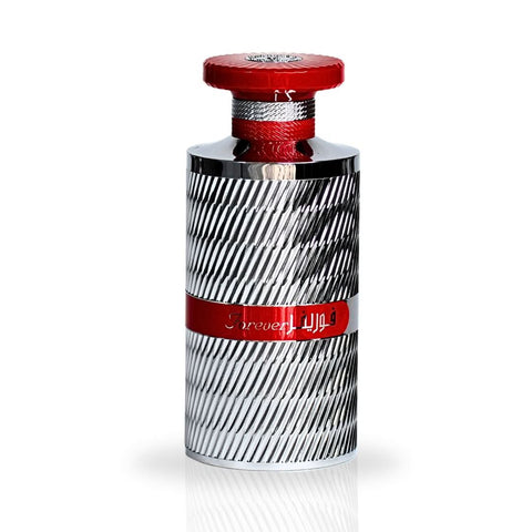Forever Silver Eau de Parfum spray by Ard Al Zaafaran in a sleek 100ml bottle, displayed with a velvet pouch.