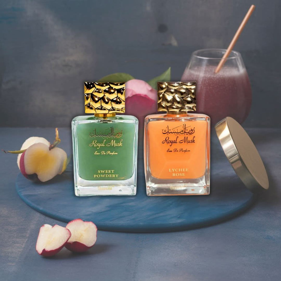 Surrati Royal Musk Sweet Powdery and Lychee Rose Eau De Parfum sprays in 100ml bottles, featuring elegant packaging.