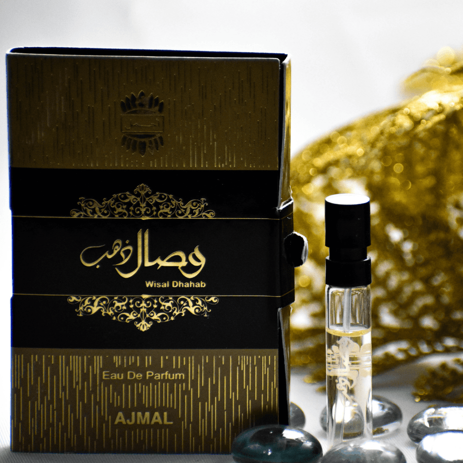 Ajmal Wisal Dhahab EDP sample bottle, 1ML unisex perfume tester with elegant packaging and clear branding.
