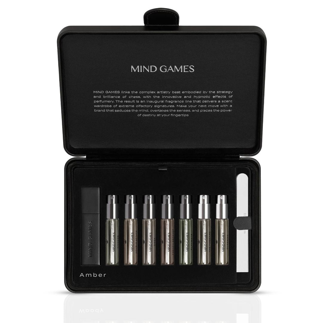 Mind Games Olfactive Amber 7-piece discovery set with seven 7.5ml perfume samples in a sleek collection.
