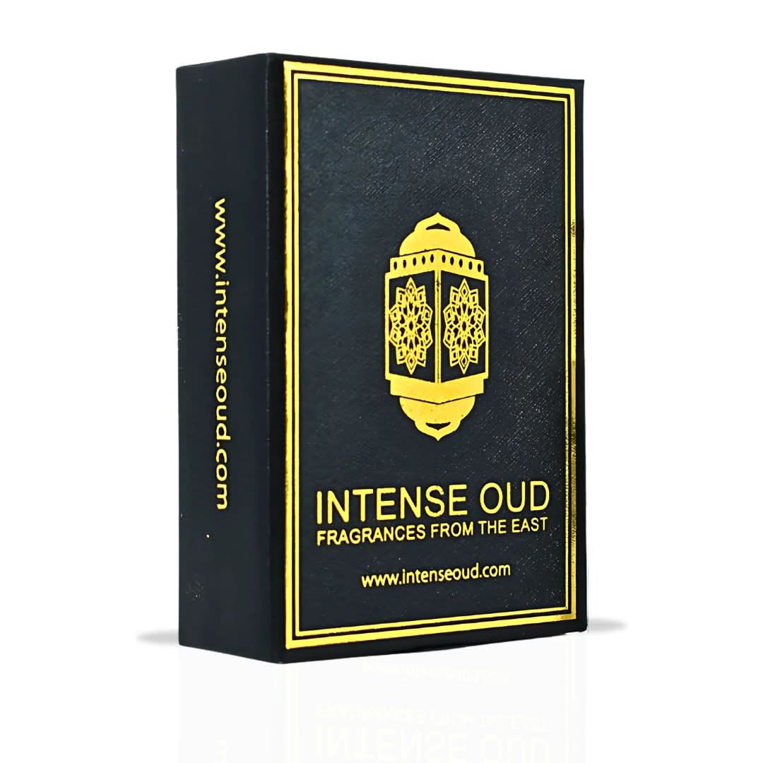 Intense Oud Warda perfume oil 12ml in a black gift box, featuring a transparent bottle with golden cap and floral accents.