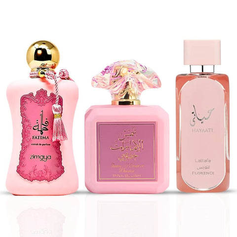 Bundle of three 100ml Eau de Parfums including Pink Blush by Ard Al Zaafaran, Hayaati Florence by Lattafa, and Fatima Pink by Zimaya.