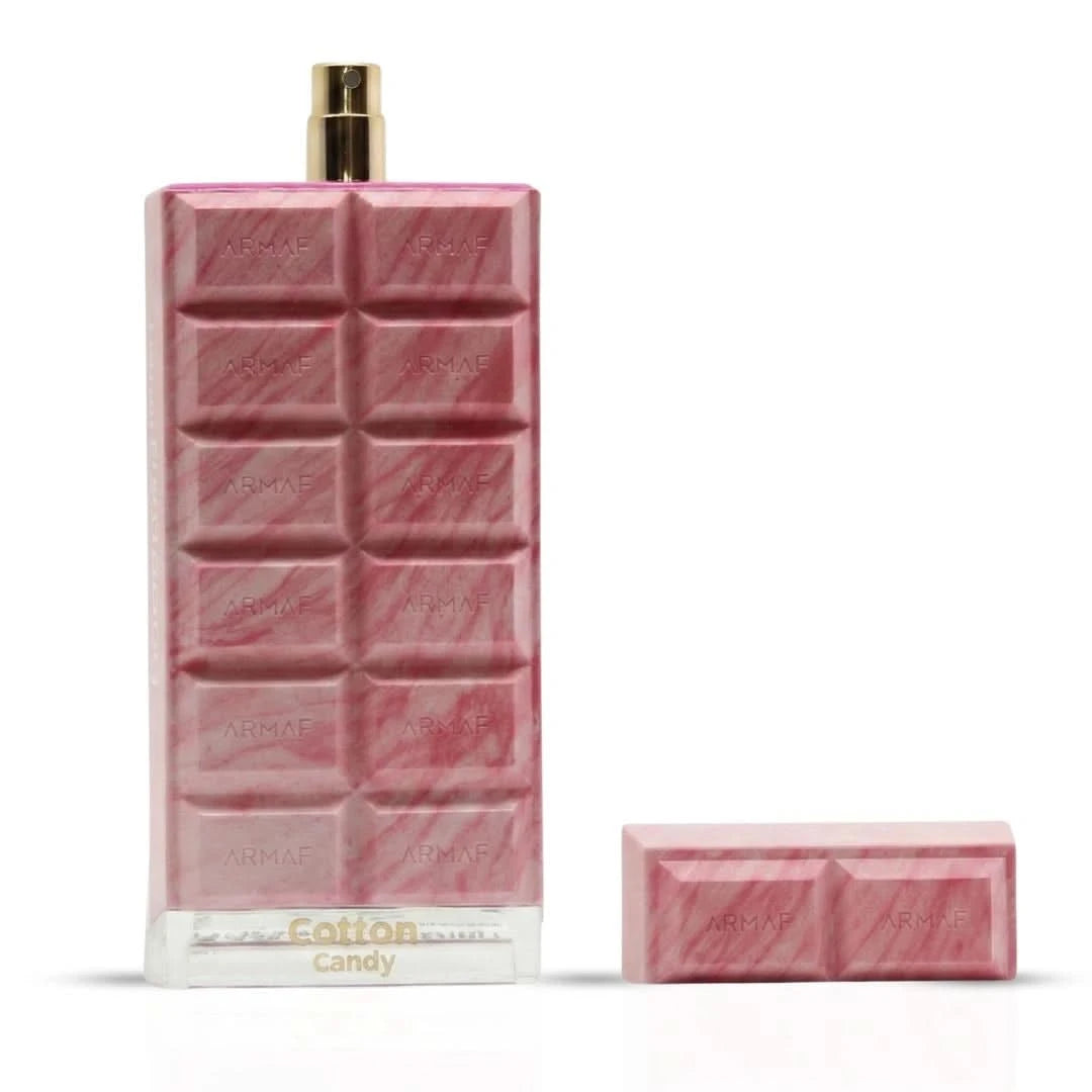 Armaf Dubai Delicacy Cotton Candy Eau de Parfum spray in a 70ml bottle with velvet pouch, featuring pink and gold accents.