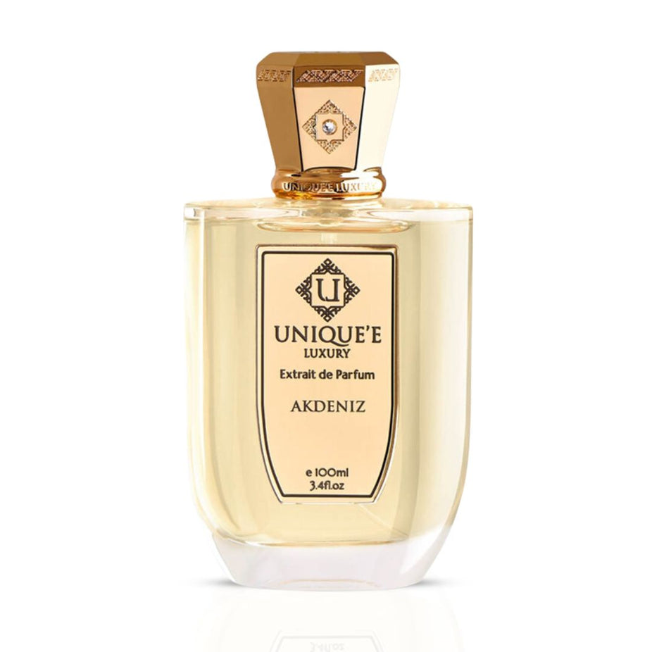 Unique'e Luxury Akdeniz Extrait de Parfum spray bottle, 100ml, with elegant packaging and branding visible.