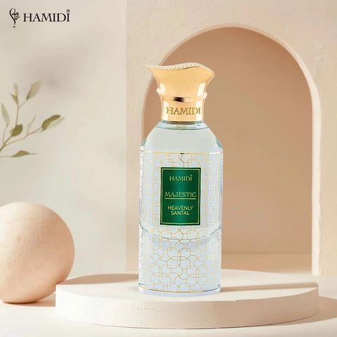 Hamidi Majestic Heavenly Santal Eau de Parfum spray 85ml in a velvet pouch, showcasing the elegant fragrance bottle.
