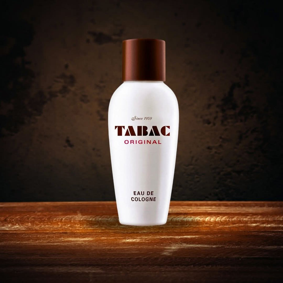 Miniature Maurer & Wirtz Tabac Original Eau De Toilette 4ml fragrance bottle, showcasing the luxurious, long-lasting scent.
