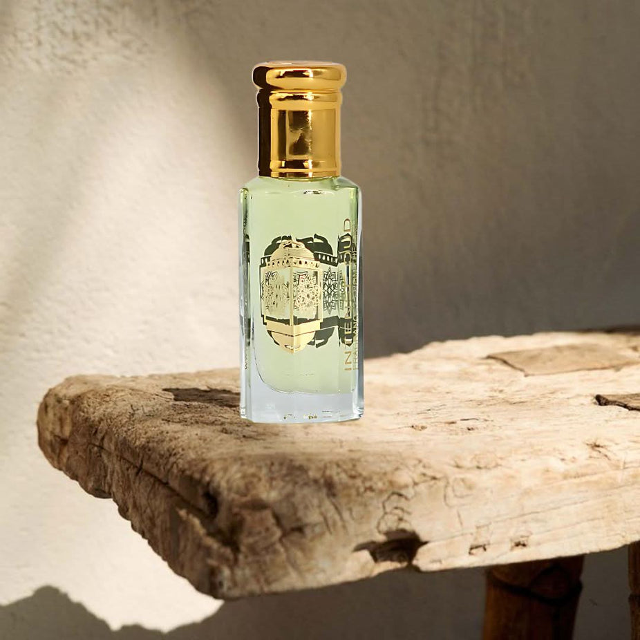 Intense Oud Nouf & Dark Amber perfume oils 12ml bundle with black gift box, featuring elegant bottles and luxurious packaging.