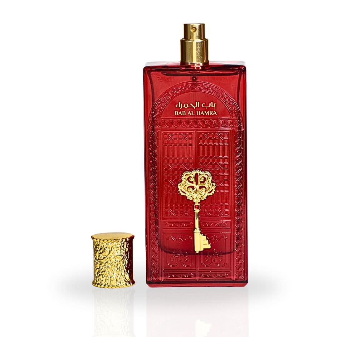 Ard Al Zaafaran Bab Al Hamra Eau de Parfum Spray 100ml with velvet pouch, featuring elegant bottle design and floral fragrance.