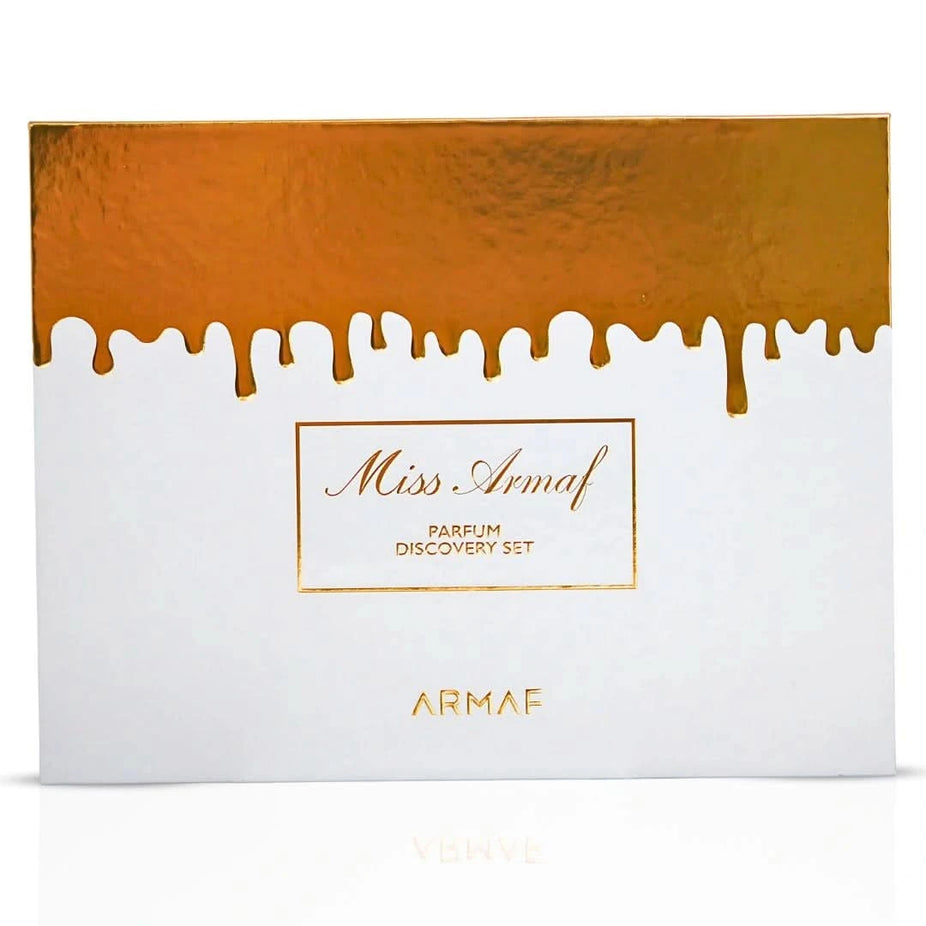 Armaf Miss Armaf Parfum Discovery Set with eight 5ml Eau de Parfum bottles in a gift box, featuring elegant perfume packaging.