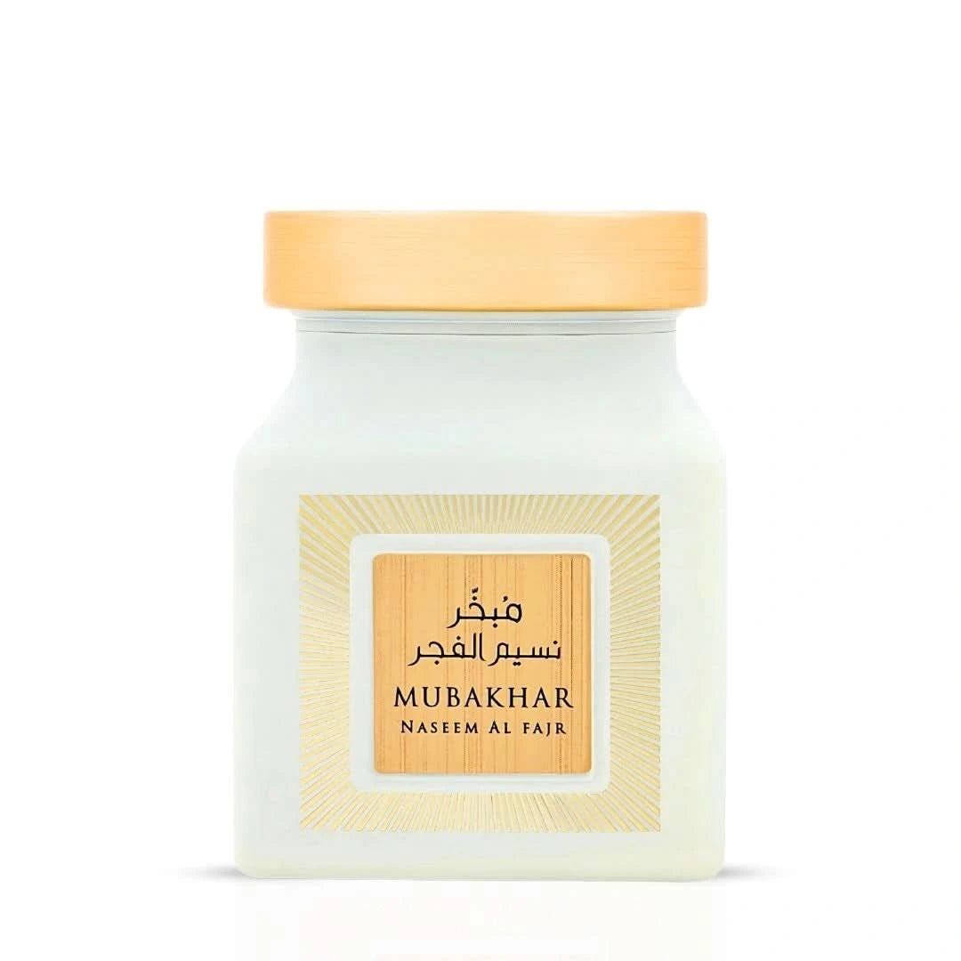 Rasasi Mubakhar Naseem Al Fajr Oudh Moattar Bakhoor 50g with aromatic incense pieces in a decorative container.