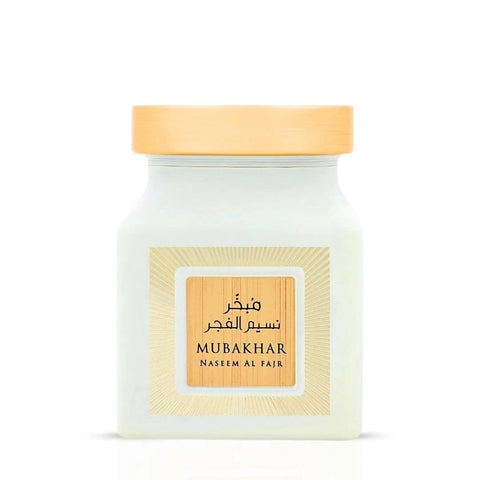Rasasi Mubakhar Naseem Al Fajr Oudh Moattar Bakhoor 50g with aromatic incense pieces in a decorative container.