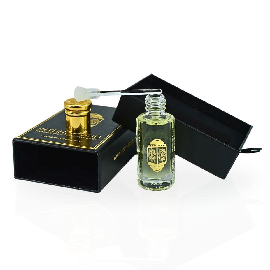Amber Rose perfume oil by Intense Oud in 12ml bottle, shown with a sleek black gift box and loose oil in a glass bottle.