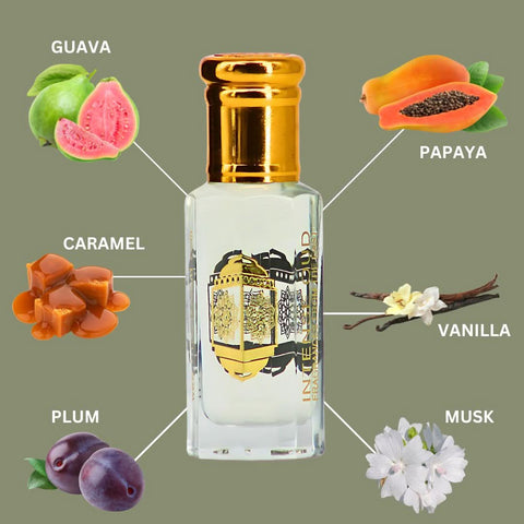Intense Oud Noble Fruits perfume oil 12ml in a black gift box, featuring a clear glass bottle with a black cap.