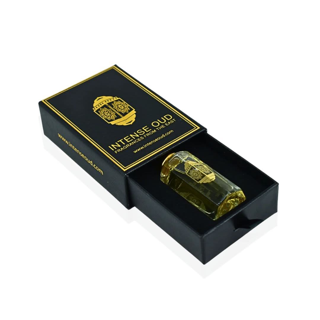 Intense Oud Scandalous Perfume Oil 12ml in a black gift box, showcasing the luxurious loose oil with elegant packaging.
