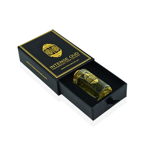 Intense Oud Scandalous Perfume Oil 12ml in a black gift box, showcasing the luxurious loose oil with elegant packaging.