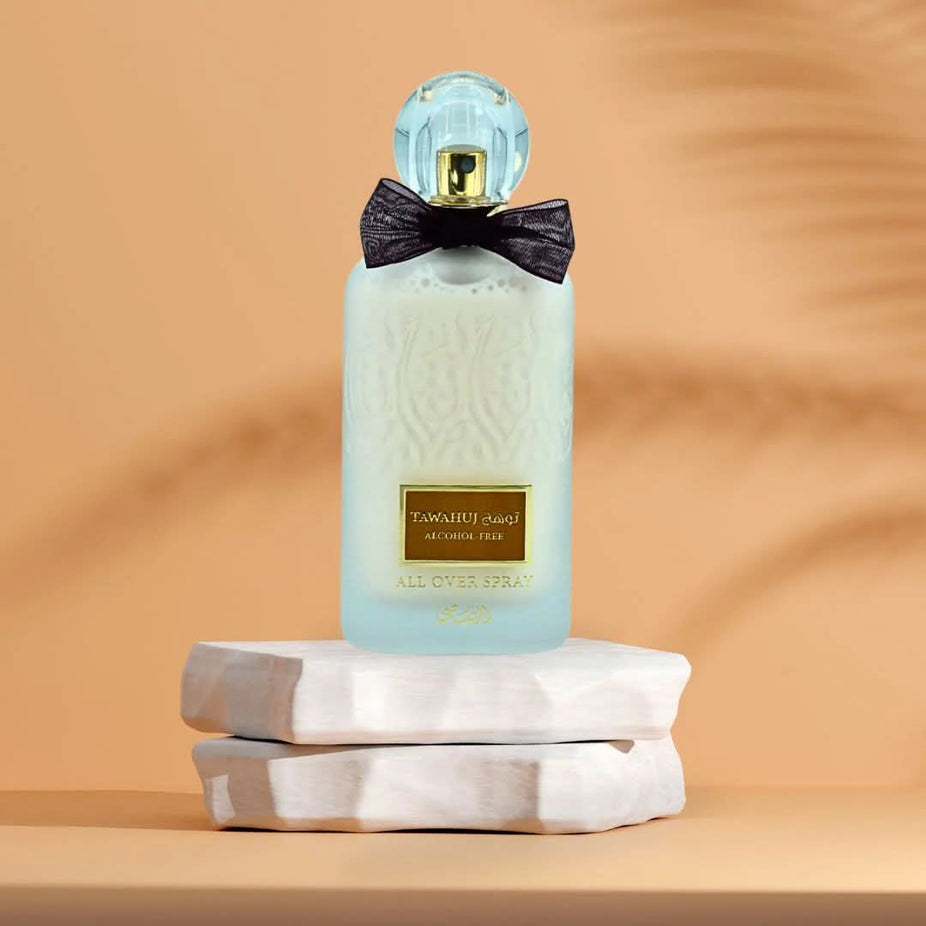 Bundle of Rasasi Tawahuj & Eshq alcohol-free Eau de Parfum sprays in 100ml bottles, featuring elegant packaging and spray nozzles.