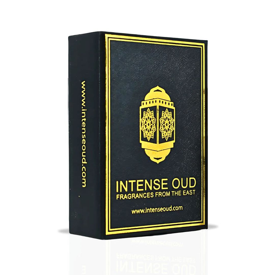 Nayel Perfume Oil 12ml by Intense Oud, loose oil in a clear bottle with black gift box, showcasing elegant packaging and brand label.